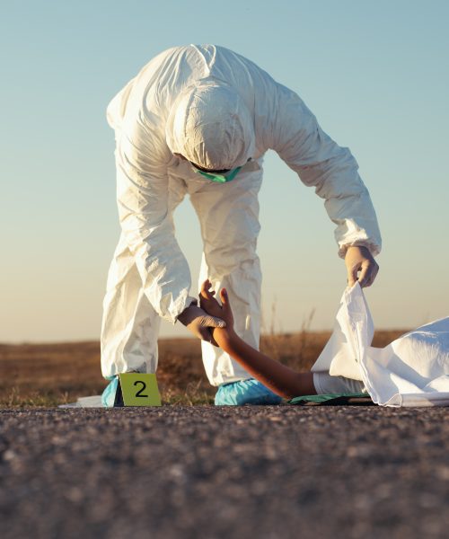 Dead body after murder at the scene after forensics by the police.
