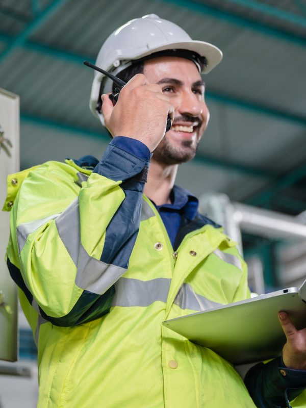 professional technician engineer working to control electrical power and safety service system, electrician working to maintenance and checking industrial equipment in term of factory technology